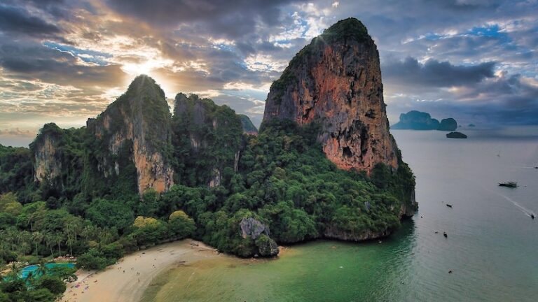 Aerial view of Railay Beach and limestone cliffs in Krabi, Thailand at sunset