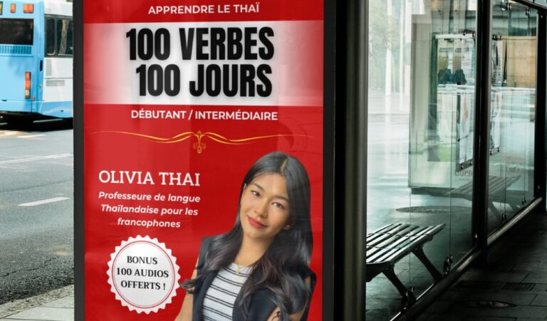 A bus stop ad for Olivia Thai's book '100 Verbs 100 Days', a method to learn Thai for beginners and intermediate learners.