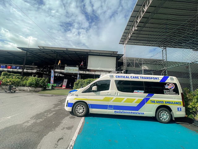 A private 'Critical Care Transport' ambulance in Thailand, highlighting the importance of a medical evacuation guarantee in a travel insurance policy.